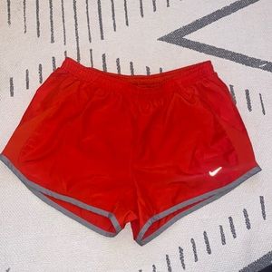 Nike, red, running shorts, size small. Good condition